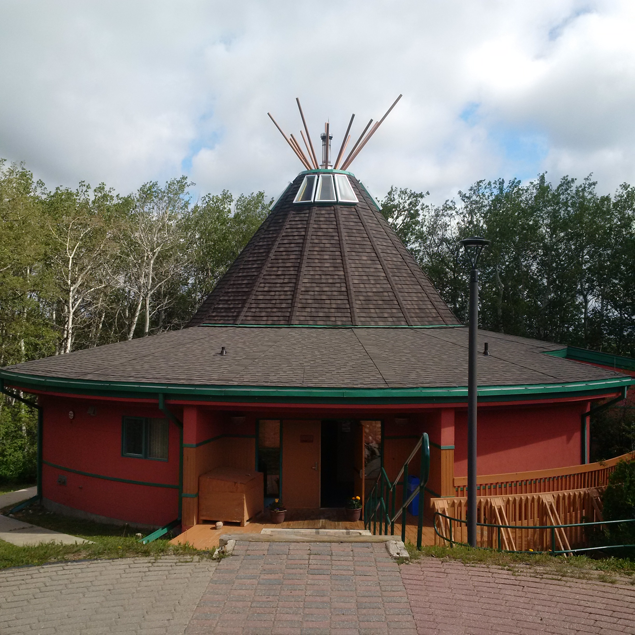 Photo from of the exterior of the residence building at Okimaw Ohci Healing Lodge.