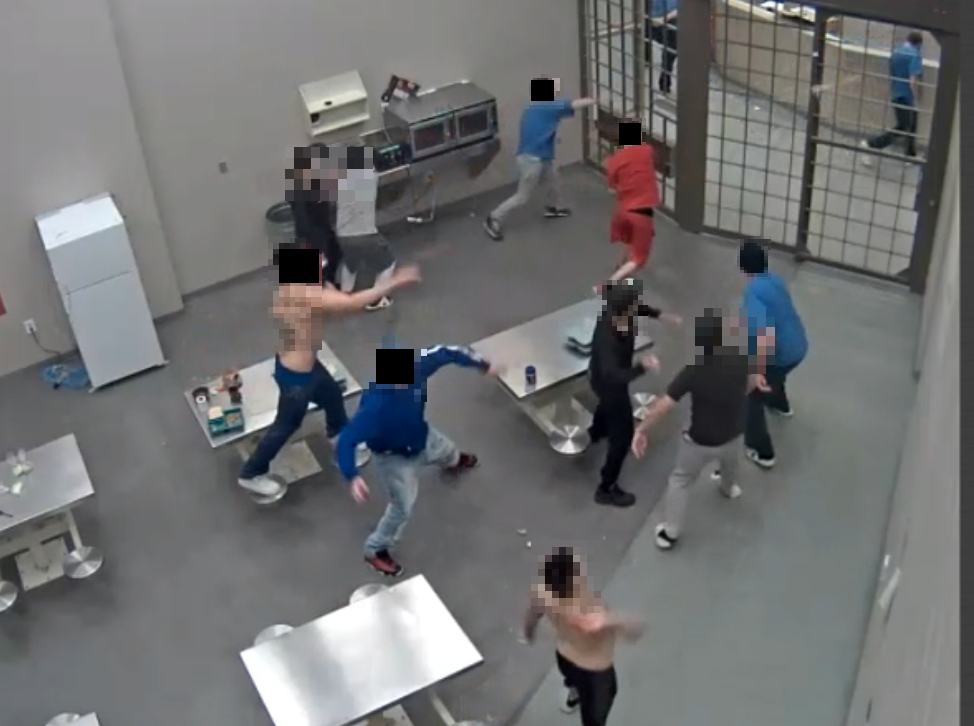 Photos of CCTV captures showing inmates throwing food at protected status inmates at Edmonton Institution