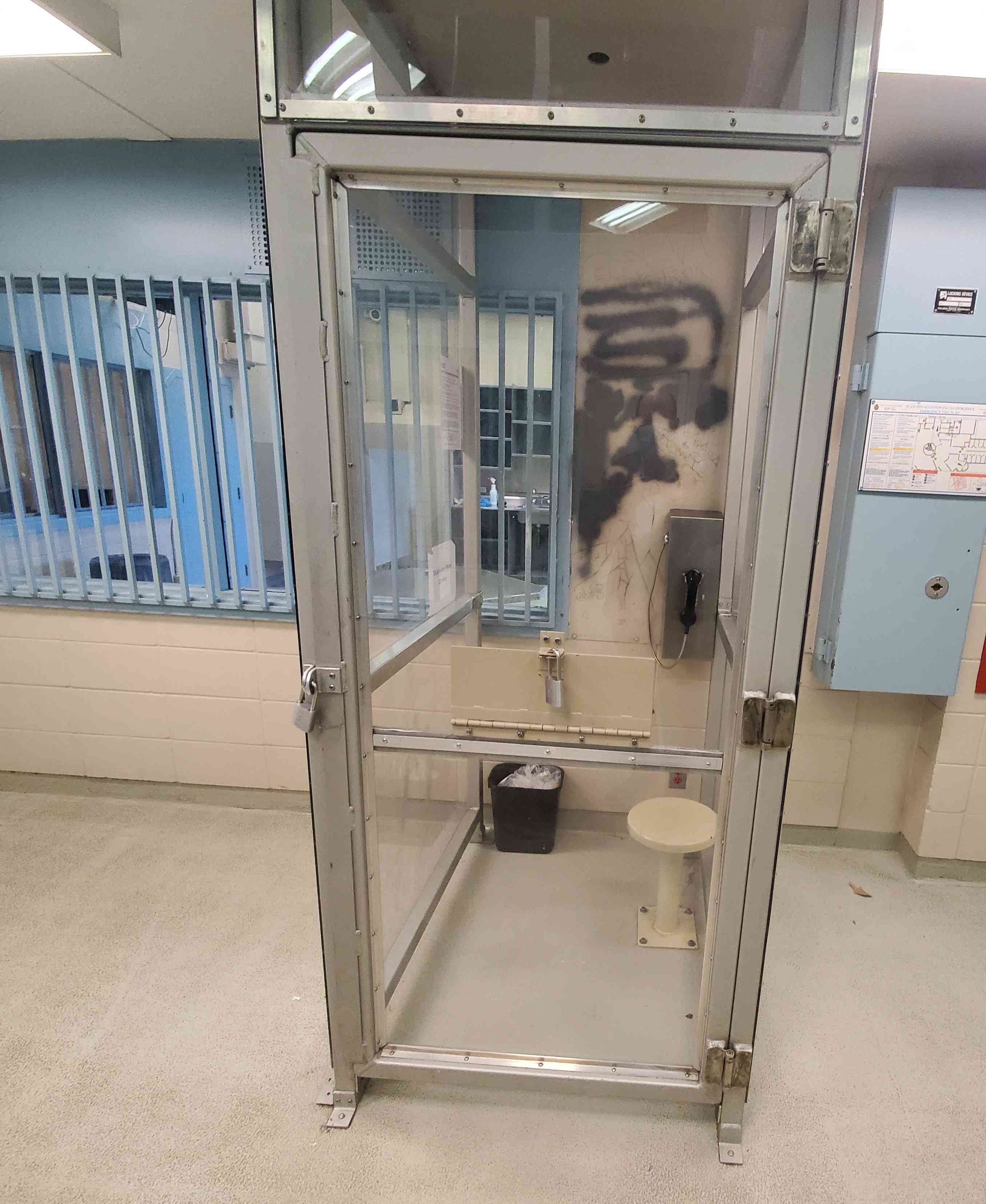 Photo of a prisoner telephone enclosure at Donnacona Institution.